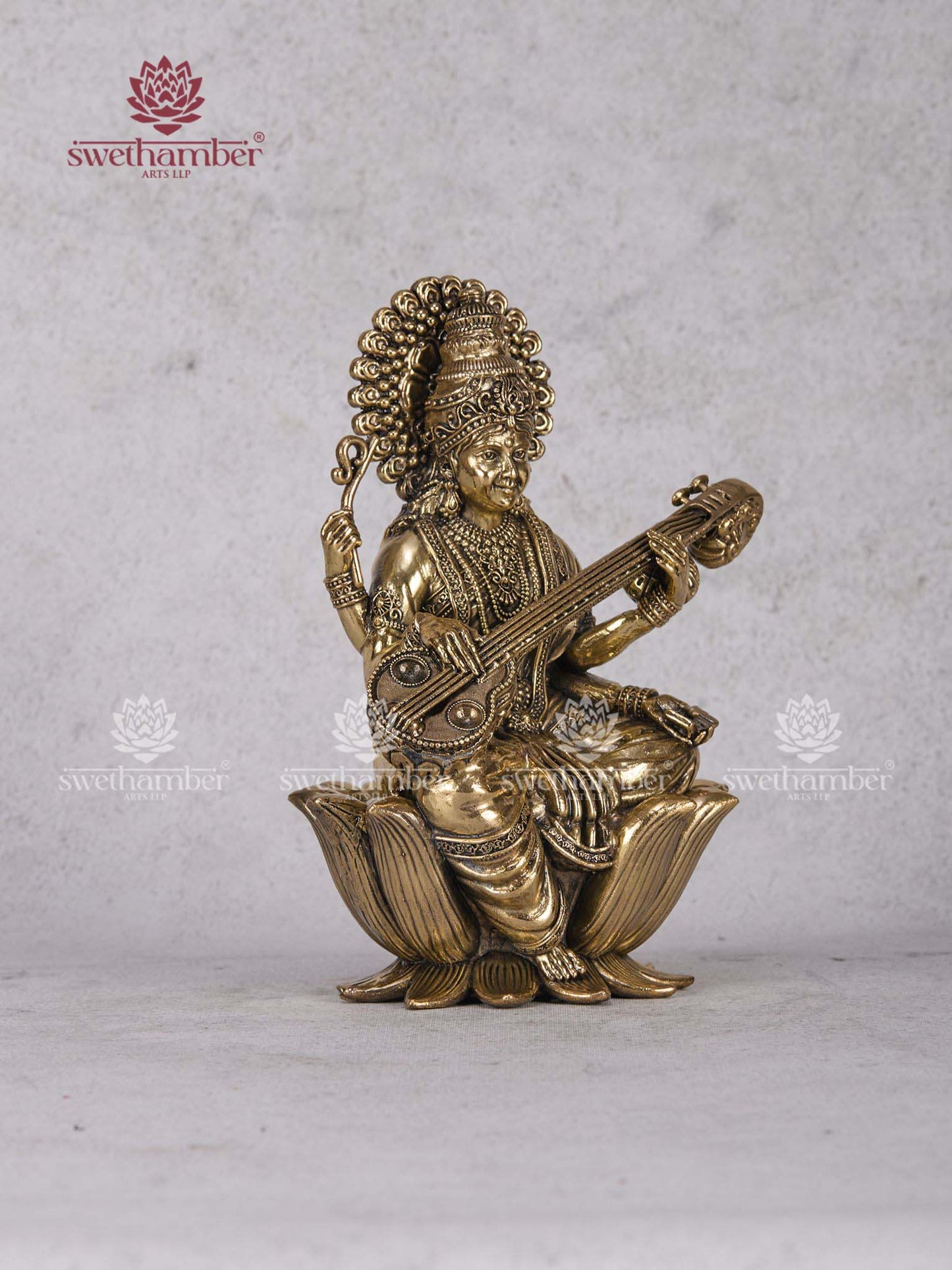 Brass Saraswathi Idol Sitting on Lotus