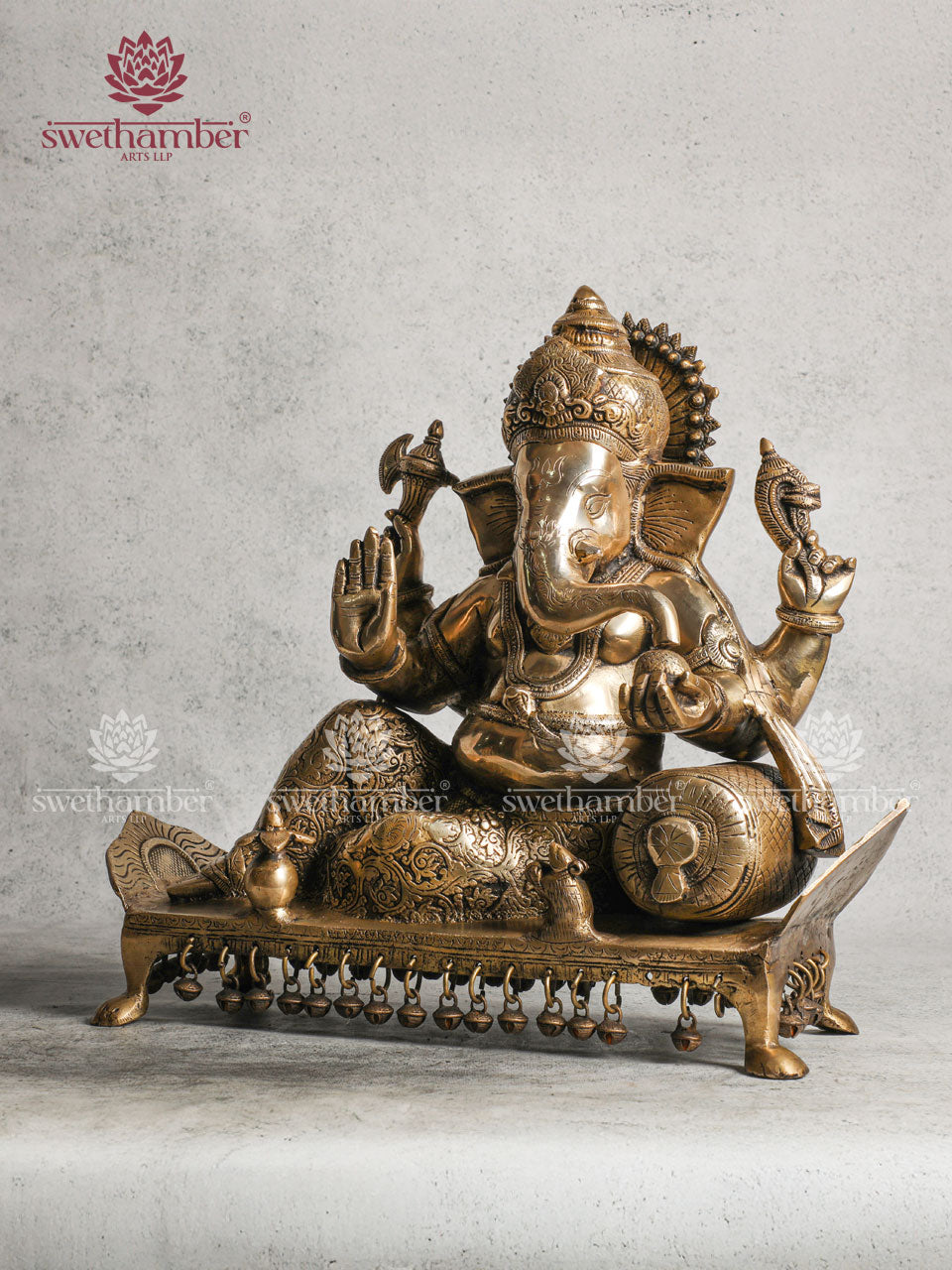 Ganesha Brass idol on sofa