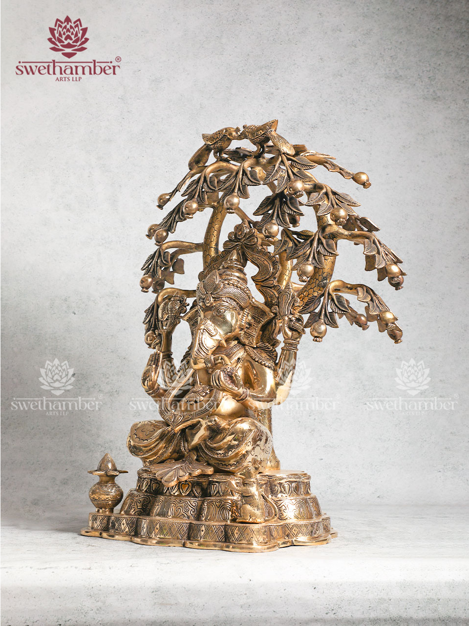 Brass Ganesha Sitting Under the Tree