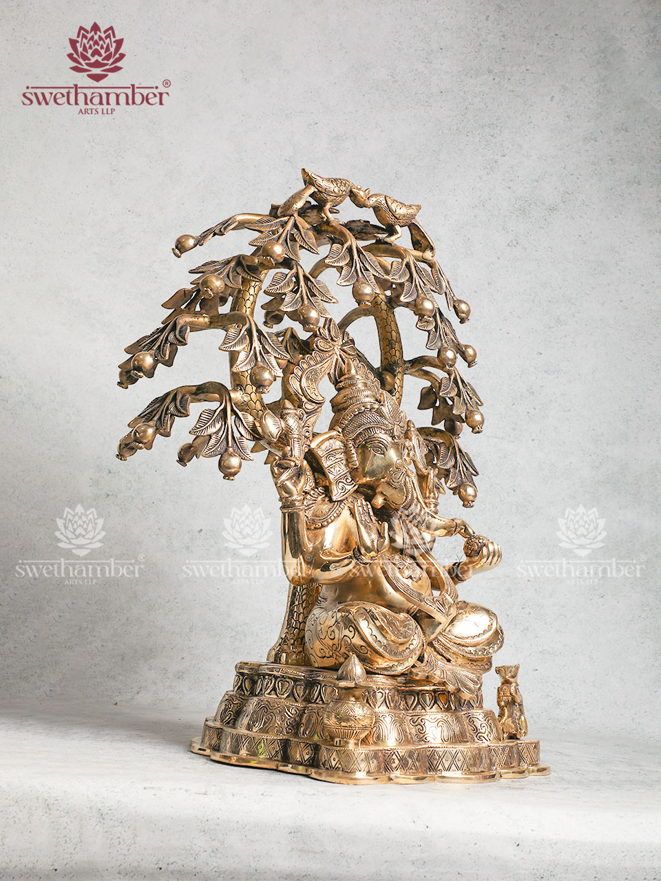 Brass Ganesha Sitting Under the Tree