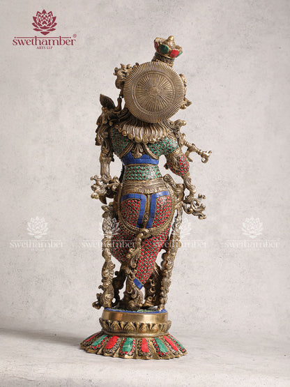 Brass Krishna idol with stone work