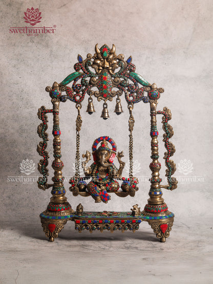BRASS GANESH ON JHULA SWING WITH COLOURFUL STONES WORK