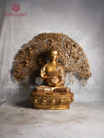 Large Brass Buddha sitting Under Tree