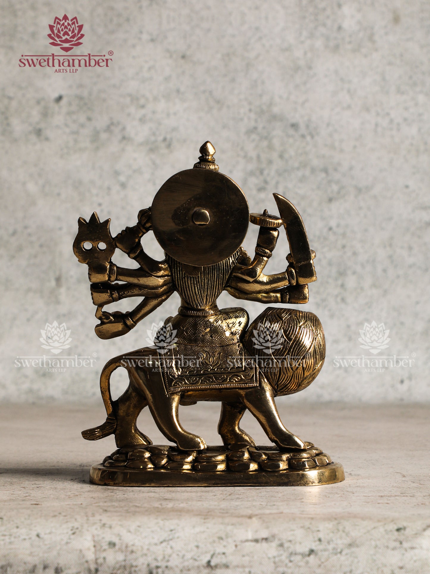 Durga statue with lion in Brass