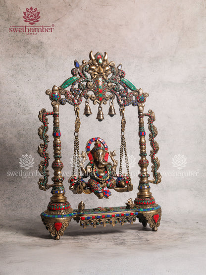 BRASS GANESH ON JHULA SWING WITH COLOURFUL STONES WORK