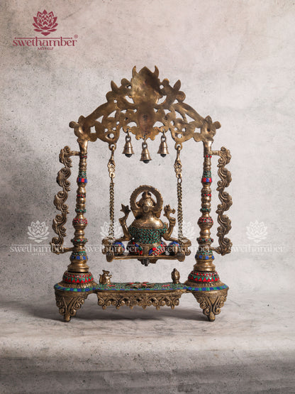 BRASS GANESH ON JHULA SWING WITH COLOURFUL STONES WORK