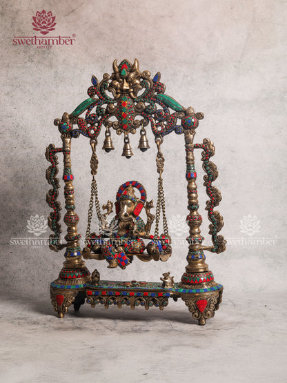 BRASS GANESH ON JHULA SWING WITH COLOURFUL STONES WORK
