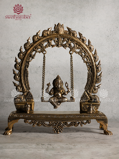 Antique Brass Ganesha Jhula Statue – Lord Ganpati Swing Idol for Vastu & Décor