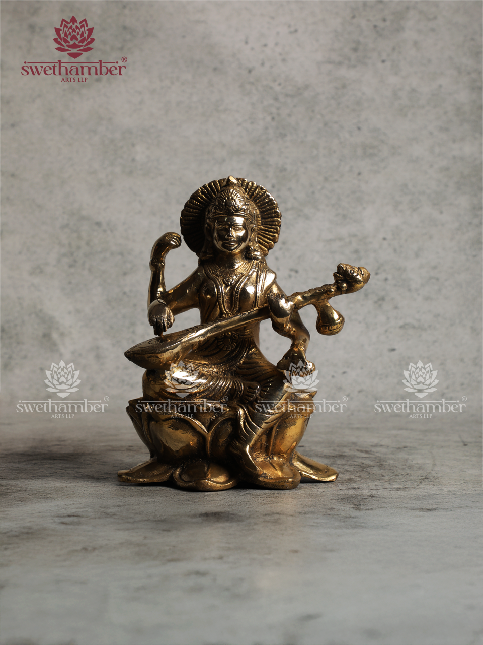 Brass Saraswati Idol Sitting on Lotus – Antique Finish