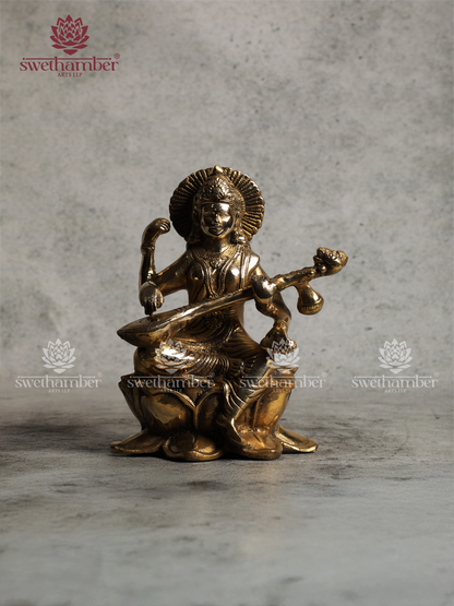 Brass Saraswati Idol Sitting on Lotus – Antique Finish