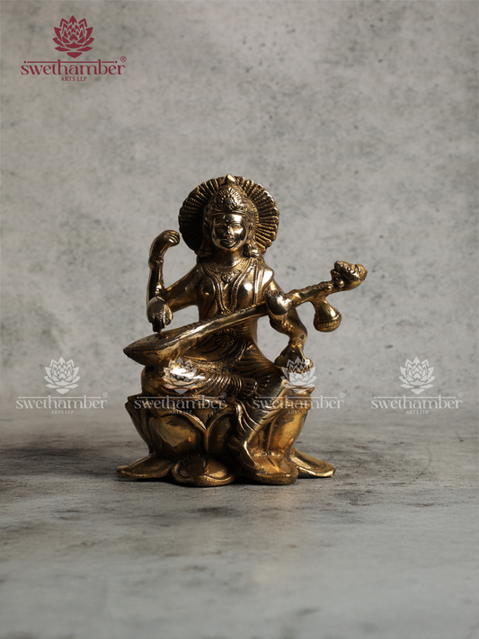 Brass Saraswati Idol Sitting on Lotus – Antique Finish