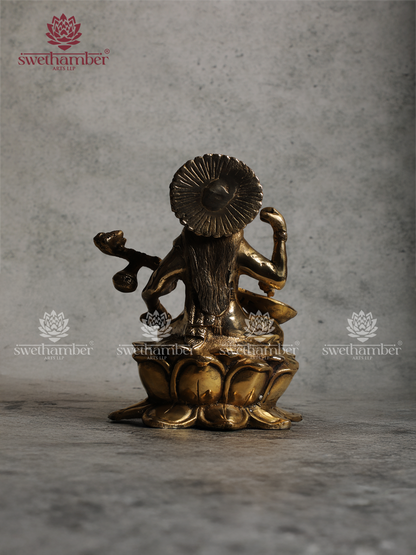 Brass Saraswati Idol Sitting on Lotus – Antique Finish