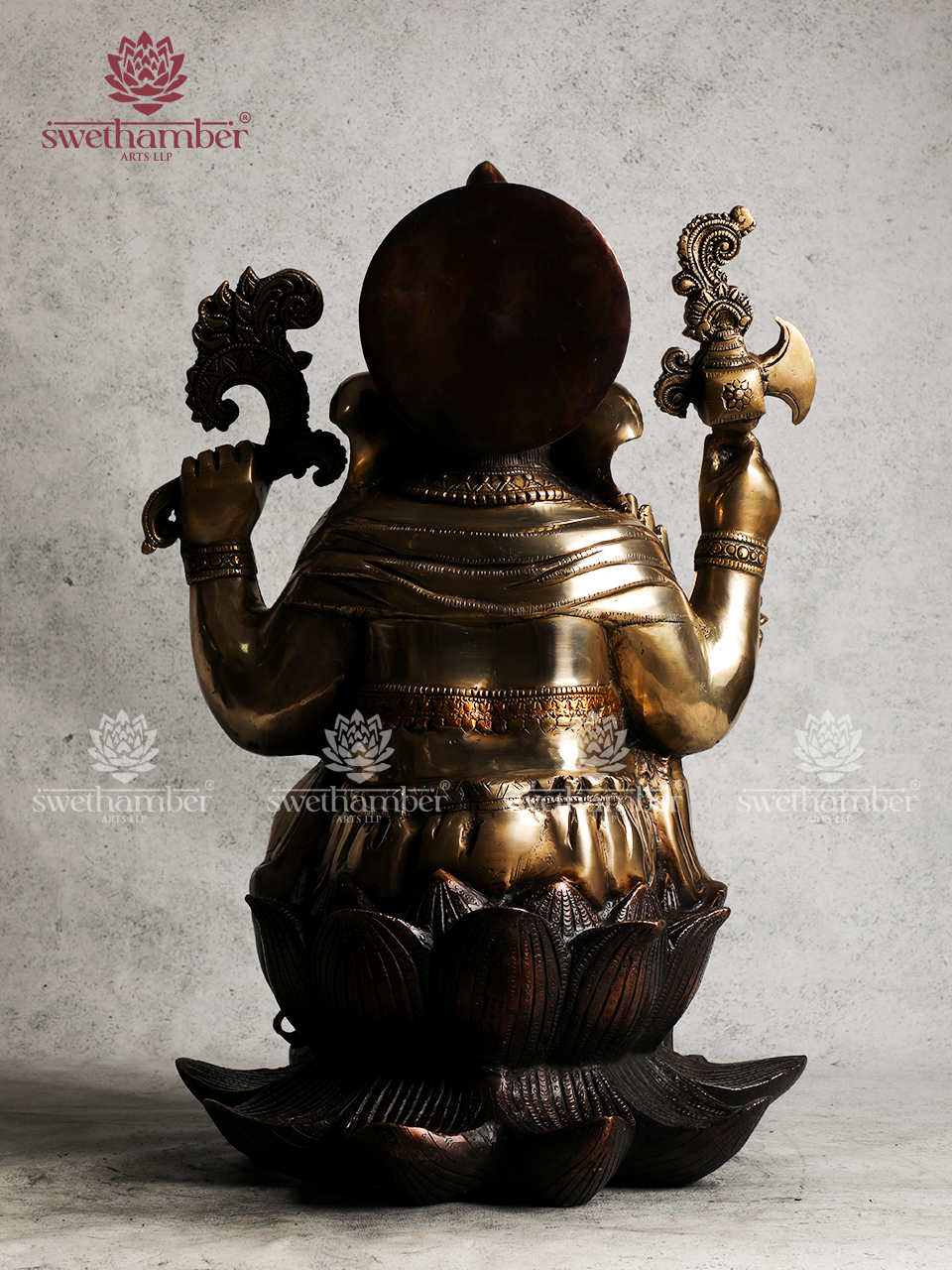 BRASS GANESHA SITTING ON LOTUS