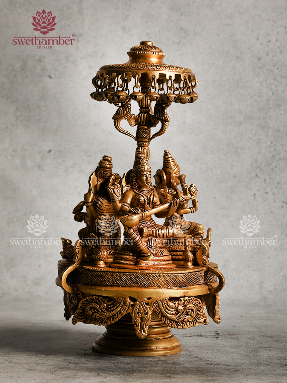 BRASS GANESHA LAXMI AND SARASWATI ON ROUND BASE