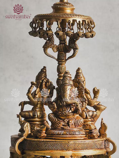 BRASS GANESHA LAXMI AND SARASWATI ON ROUND BASE