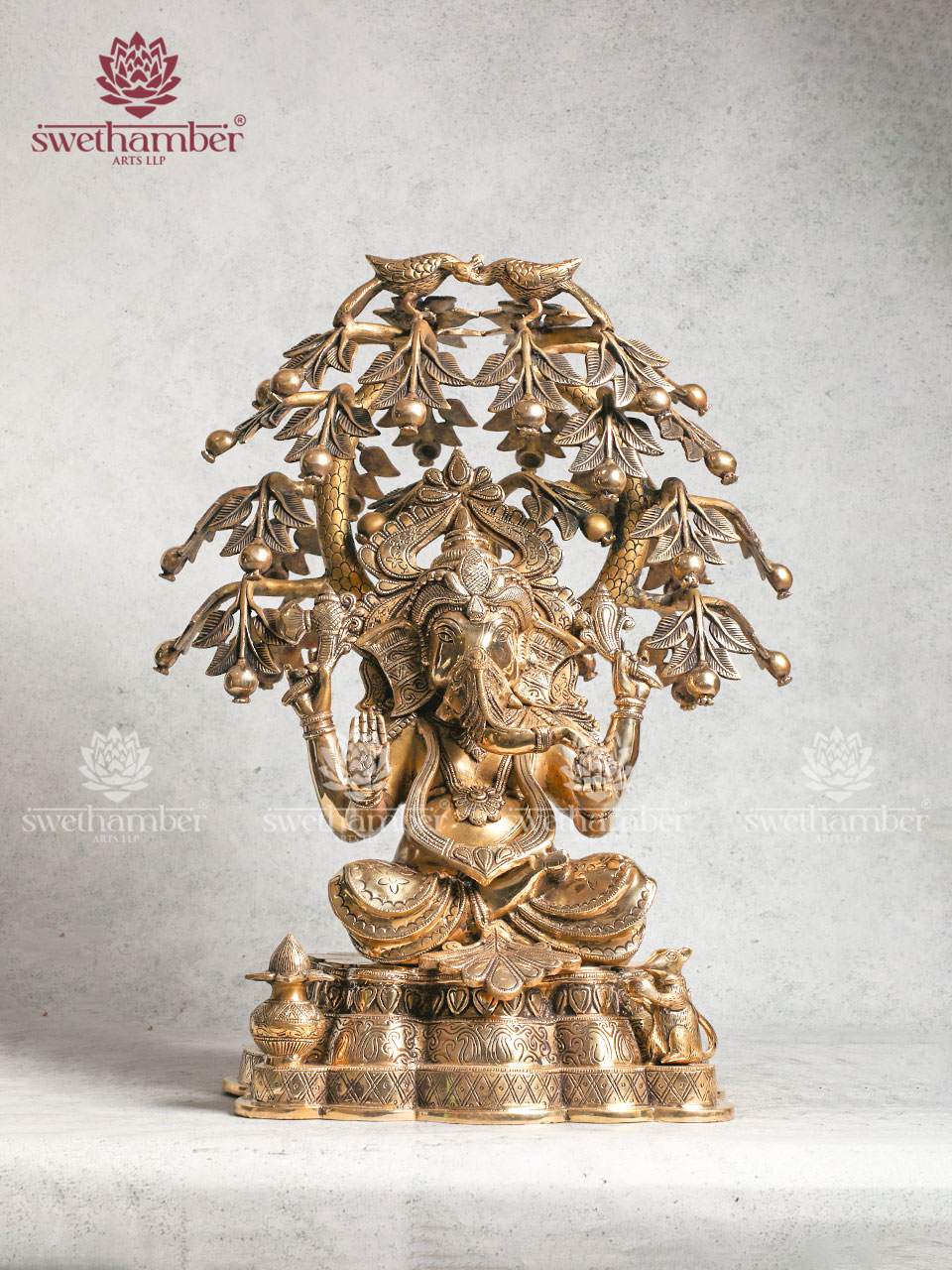 Brass Ganesha Sitting Under the Tree